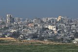 Budovy v Gaze leží v troskách uprostřed probíhajícího konfliktu mezi Izraelem a palestinskou islamistickou skupinou Hamás, pohled z Izraele
