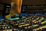Obrazovky ukazují výsledky hlasování během hlasování Valného shromáždění OSN o návrhu rezoluce, která by uznala Palestince za způsobilé stát se plnoprávným členem OSN, New York, USA, 10. května 2024