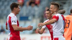 Slávisté Lukáš Masopust, Nicolae Stanciu a Stanislav Tecl (zleva) se radují z gólu proti Českým Budějovicím.