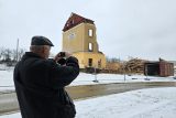 Poslední stojící zeď budovy si přišel vyfotografovat i František Vetyška