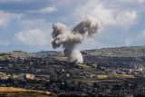 Stoupající dým nad Libanonem po izraelském úderu