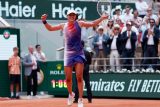 Polská tenistka Iga Šwiateková se raduje z titulu na turnaji French Open 2024
