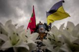 Ukrajinská vlajka nad hrobem judisty Stanislava Hulenkova