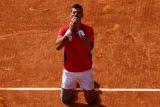 Srbský tenista Novak Djoković po vítězství v olympijském finále nad Španělem Carlosem Alcarazem