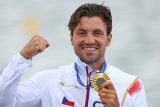 Rychlostní kanoista Martin Fuksa se zlatou olympijskou medailí