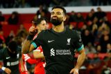 Křídelník Liverpoolu Mohamed Salah slaví gól do sítě Girony