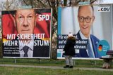 Předvolební plakáty CDU a SPD