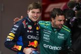 Max Verstappen a Fernando Alonso