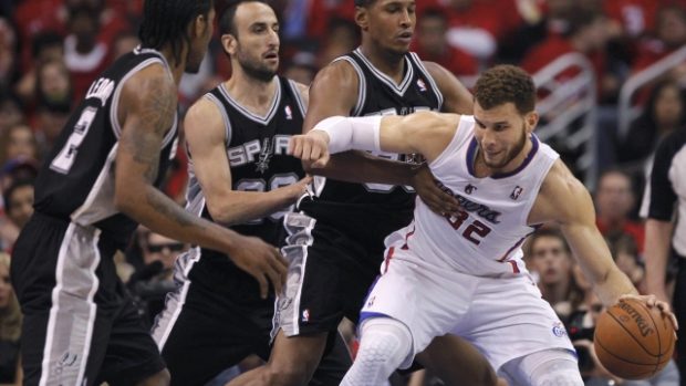 Los Angeles Clippers  power forward Blake Griffin (32) is guarded by San Antonio Spurs small forward Kawhi Leonard (2), Manu Ginobili (20) and Boris Diaw (33) during Game 4 of their NBA Western Conference semi-final playoff basketball game in Los Angeles