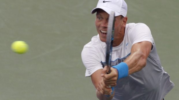 Tomáš Berdych, of the Czech Republic, returns a volley to Milos Raonic, of Canada, during a match at the Western &amp; Southern Open tennis tournament, Thursday Aug. 16, 2012, in Mason, Ohio. (AP Photo/Tom Uhlman)