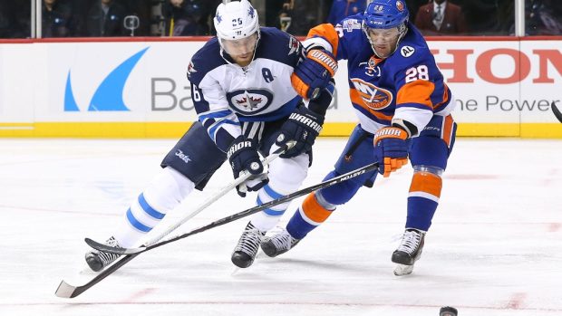 Obránce Marek Židlický v dresu New York Islanders