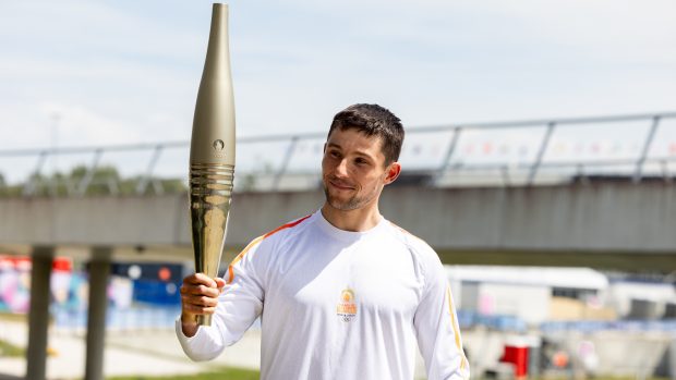 Jiří Prskavec s olympijskou pochodní