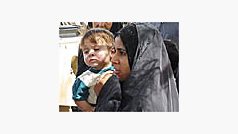 muslimská žena s dítětem