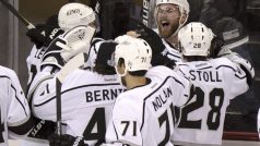 Los Angeles Kings&#039; Jeff Carter  celebrates his game-winning goal in overtime against the New Jersey Devils with teammates in Game 2 of the NHL Stanley Cup hockey final in Newark, New Jersey, June 2, 2012