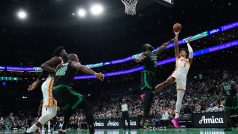 Atlanta Hawks forward Jalen Johnson (1) shoots against Boston Celtics guard Jaylen Brown (7) in the first quarter at TD Garden