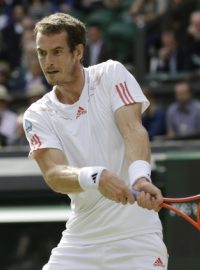 Andy Murray of Britain plays a shot to David Ferrer of Spain during a quarterfinals match at the All England Lawn Tennis Championships at Wimbledon, England, Wednesday July 4, 2012.