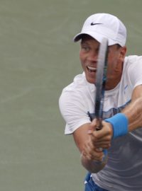 Tomáš Berdych, of the Czech Republic, returns a volley to Milos Raonic, of Canada, during a match at the Western &amp; Southern Open tennis tournament, Thursday Aug. 16, 2012, in Mason, Ohio. (AP Photo/Tom Uhlman)