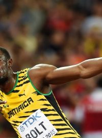 Jamajčan Bolt slaví na atletickém MS v Pekingu vítězství ve sprintu na 100 metrů