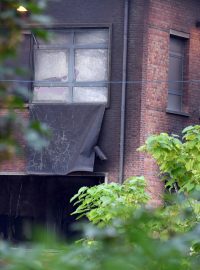 Poškozená budova kriminologického institutu na severu Bruselu